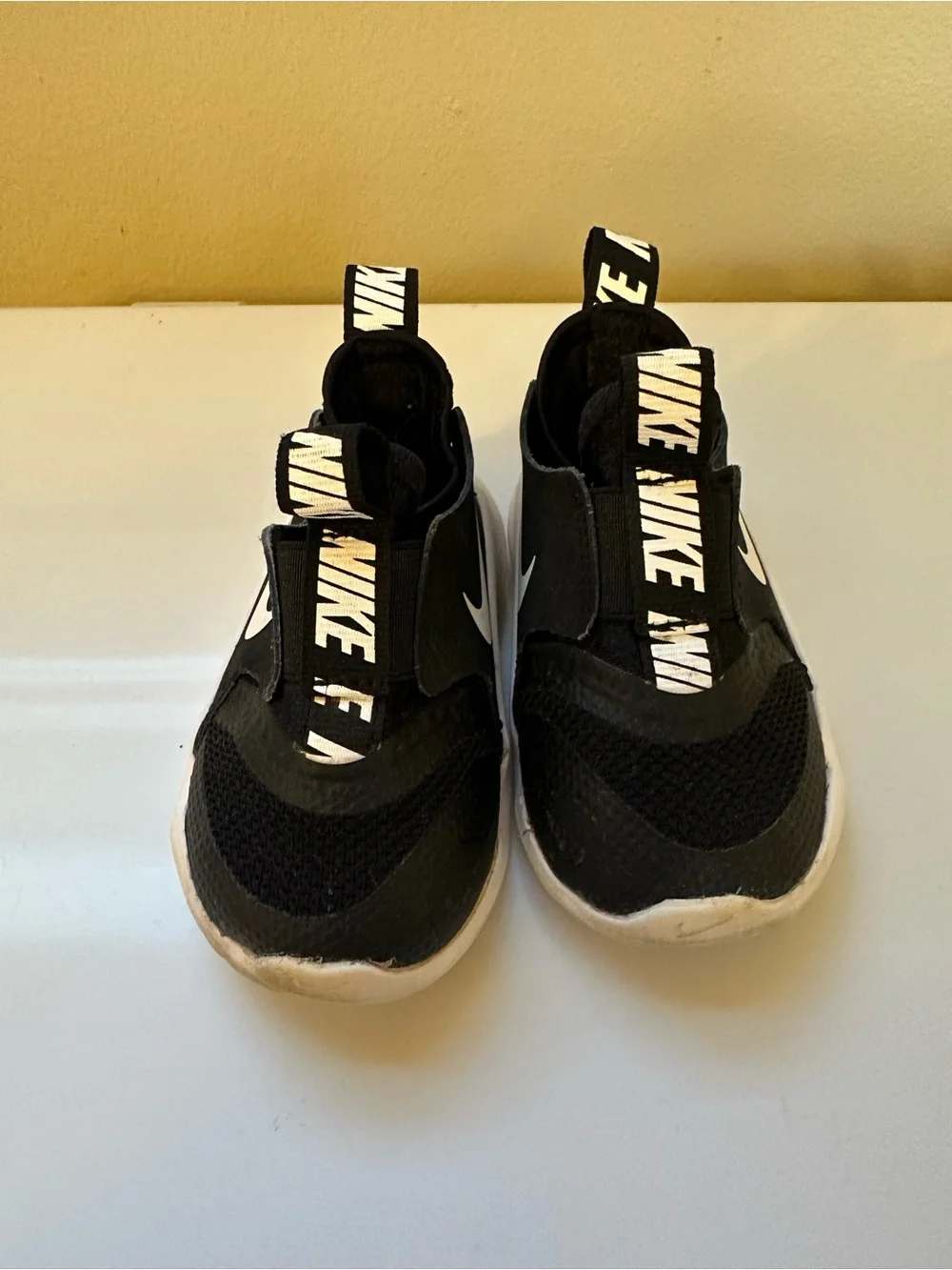Nike Kids Black & White Slip-On Athletic Sneakers